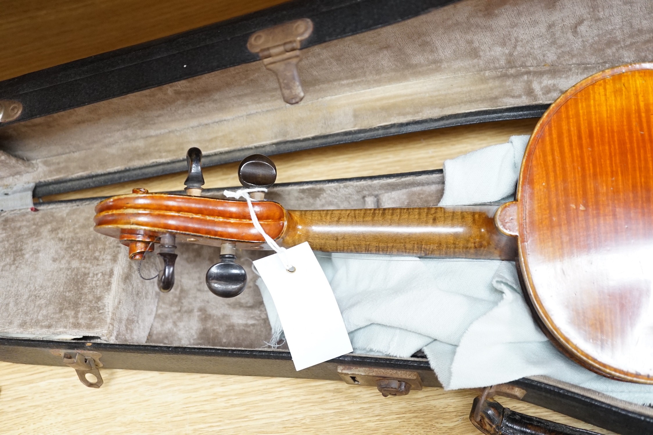 A 19th century French Grandjon school violin, labelled Joseph Guarnerins fecit Cremonae anno 1719 IHS, length of back 35.5 cm (14in.), cased
